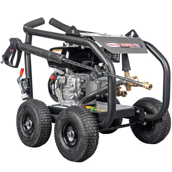 A black Simpson pressure washer with wheels and a hose attached.