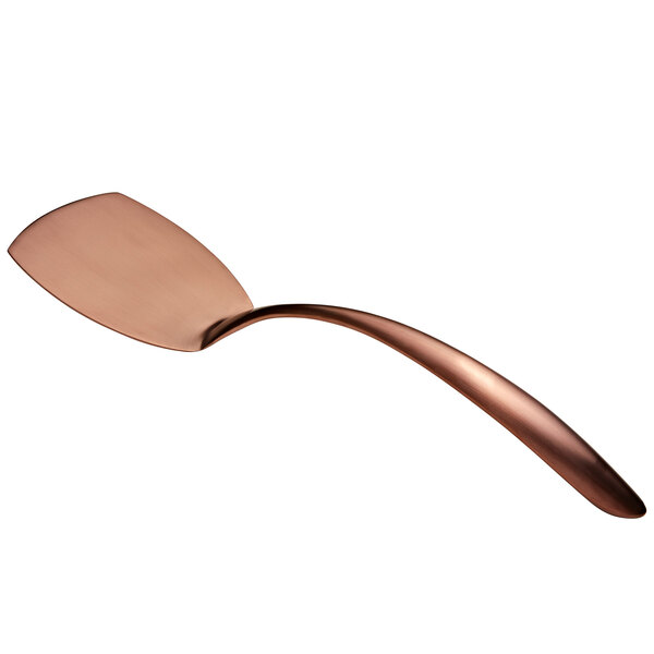 A close-up of a rose gold matte stainless steel serving turner with a hollow handle.