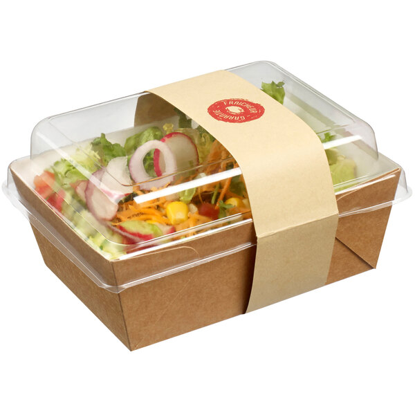 A Solia small Kraft salad container with a clear plastic lid containing a salad.