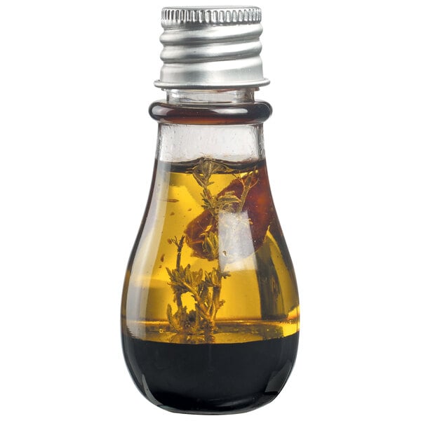 A Solia clear plastic bottle filled with a small amount of oil.
