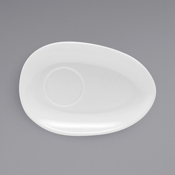 A white oval plate with a small oval in the middle.