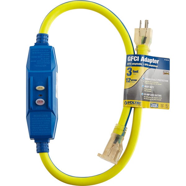 A blue and yellow Voltec 12/3 extension cord with a yellow plug and lighted end.