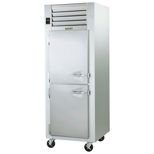 A Traulsen hot food holding cabinet with left hinged doors.