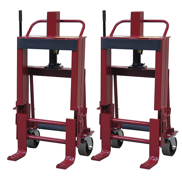 A pair of red Wesco machinery movers with black handles and 6" polyurethane casters.