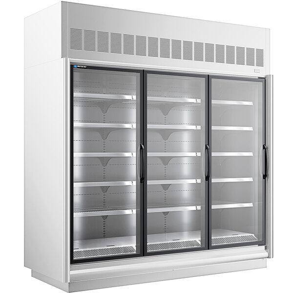 A white Master-Bilt glass door merchandiser freezer with three open doors.
