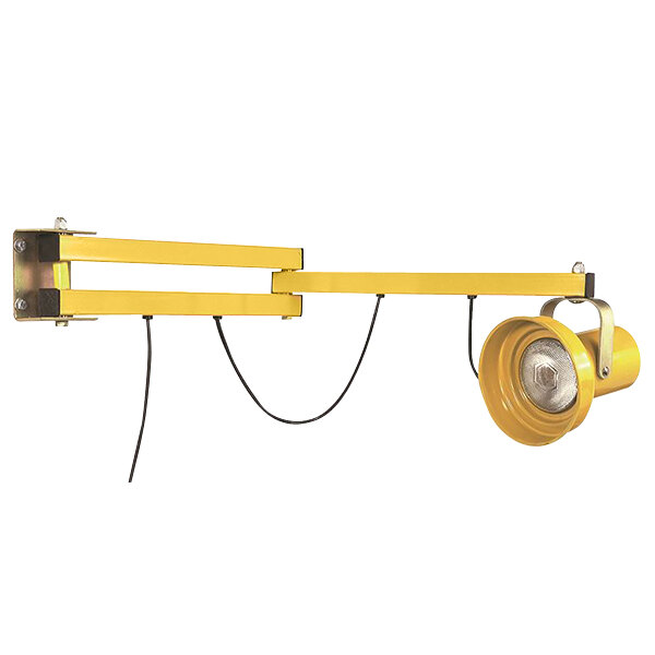 A yellow light fixture with a black wire attached to it.