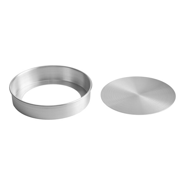 A round aluminum cheesecake pan with a removable bottom.