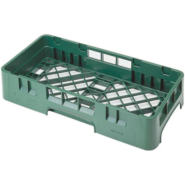 A green plastic tray with holes for Cambro dish racks.