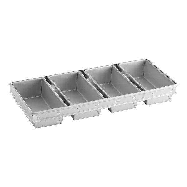 A four-compartment glazed aluminized steel bread loaf pan.
