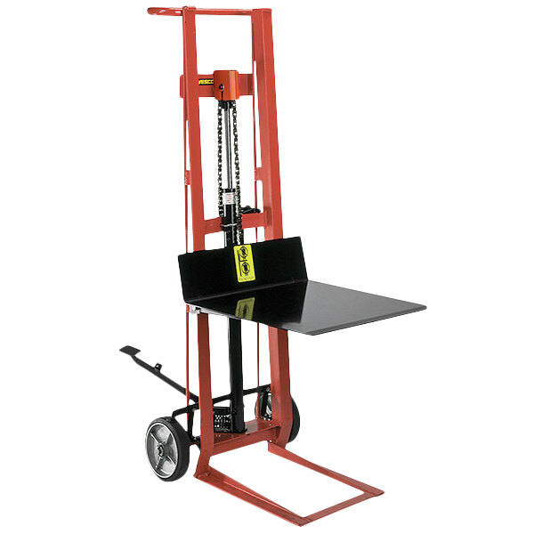 A red and black hydraulic Pedalift with a black table on top.