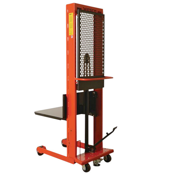 A red and black Wesco hydraulic lift with a metal platform.
