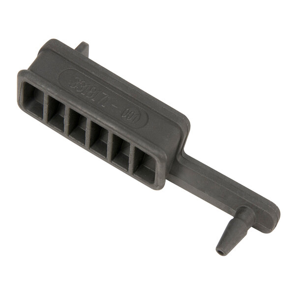 A grey plastic USB cover with nozzles.