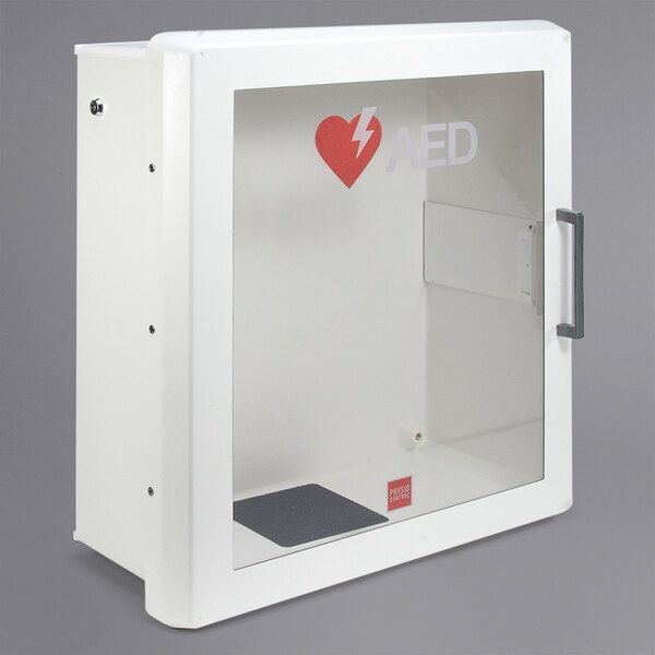 A white Physio-Control AED cabinet with a glass door and a red heart with a lightning bolt on it.