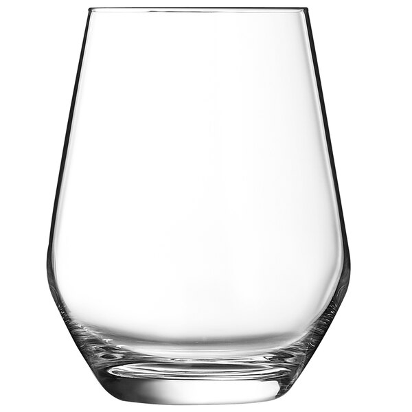 An Arcoroc highball glass with a white background.