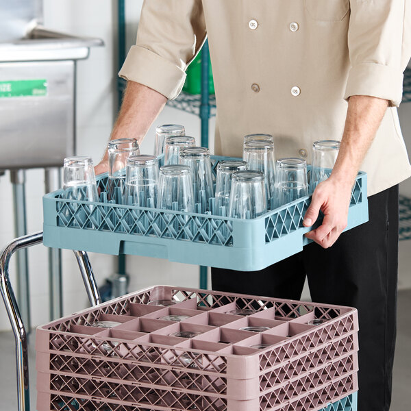 A Noble Warewashing full-size all purpose peg rack with open sides holding several glass cups.