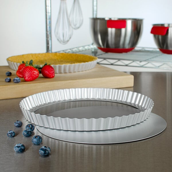 Fat Daddio's PFT-11 ProSeries 11" x 1" Round Anodized Aluminum Fluted Tart / Quiche Pan with Removable Bottom