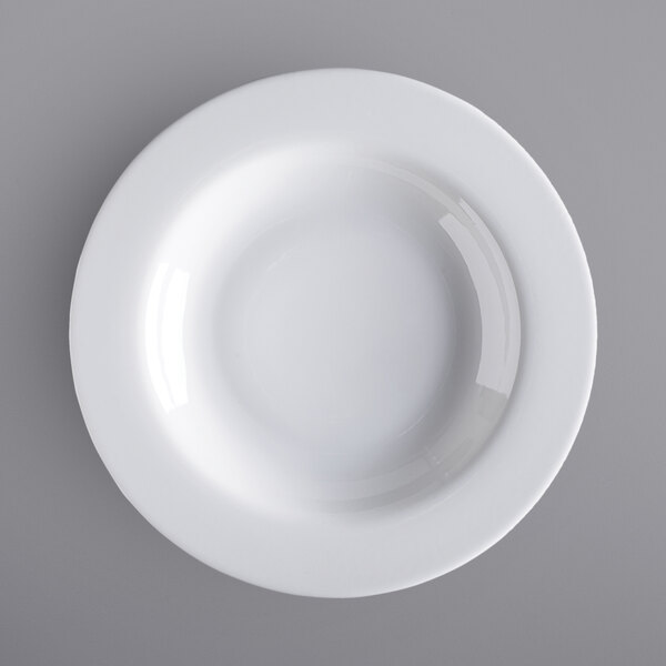 A close-up of a white Corona by GET Enterprises wide rim pasta bowl.