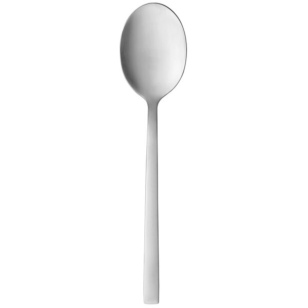 A Libbey Elexa dessert spoon with a white handle.
