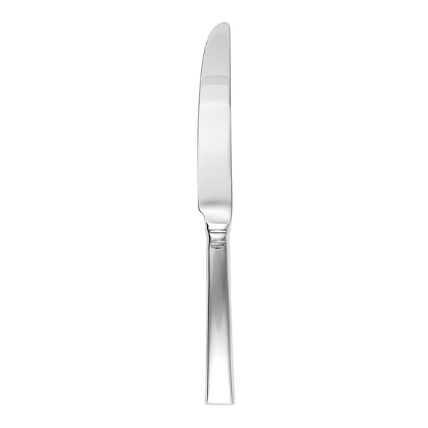 A close-up of a Fortessa Scalini stainless steel dinner knife.