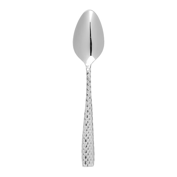 A Fortessa Lucca stainless steel serving spoon with a faceted handle.