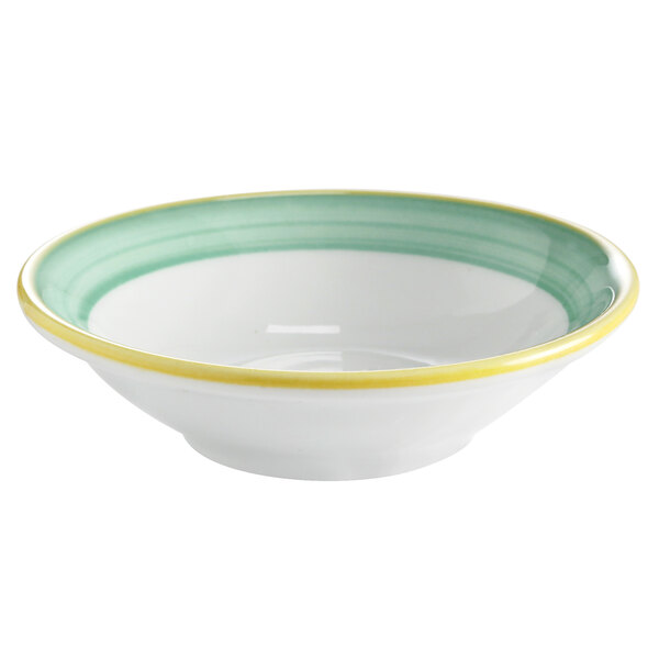 A white bowl with green and yellow rim stripes.