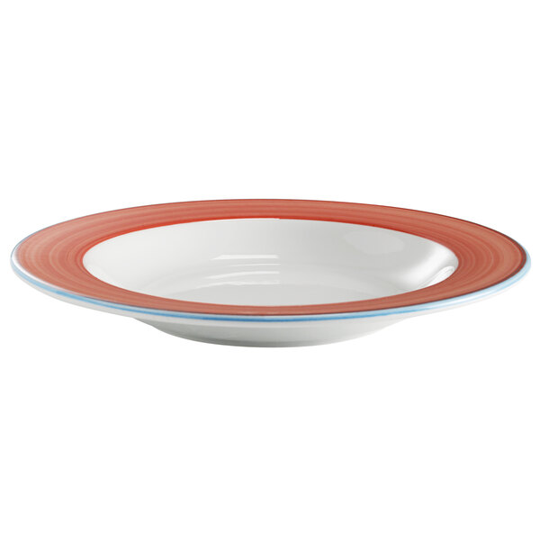 A white porcelain bowl with a coral and blue stripe on the rim.