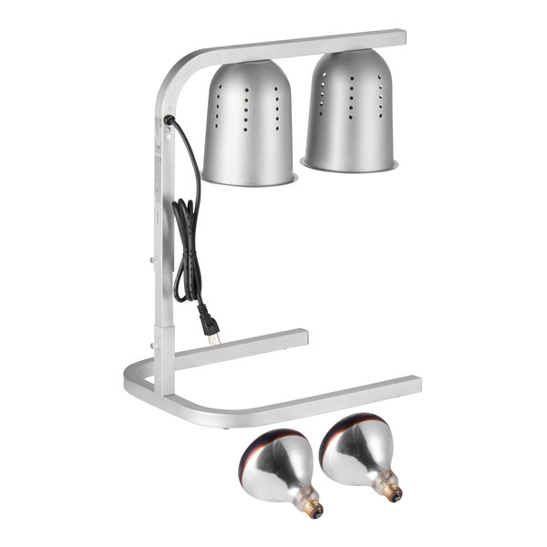 A silver two-bulb free standing heat lamp and food warmer with a power cord and two red bulbs.