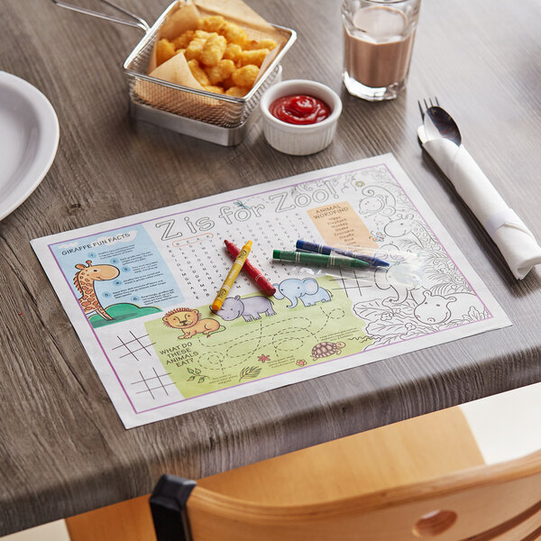 A table with a Choice kids zoo themed placemat and food.