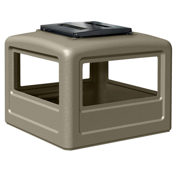 A grey plastic square lid with a black dome on top.