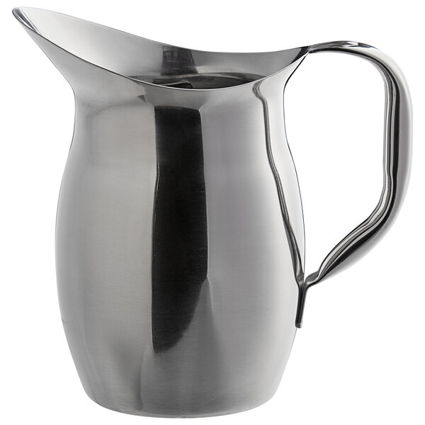 A Libbey stainless steel pitcher with a handle.