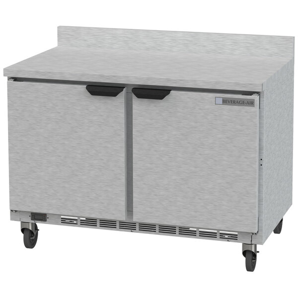 A stainless steel Beverage-Air worktop refrigerator with two doors and two drawers.