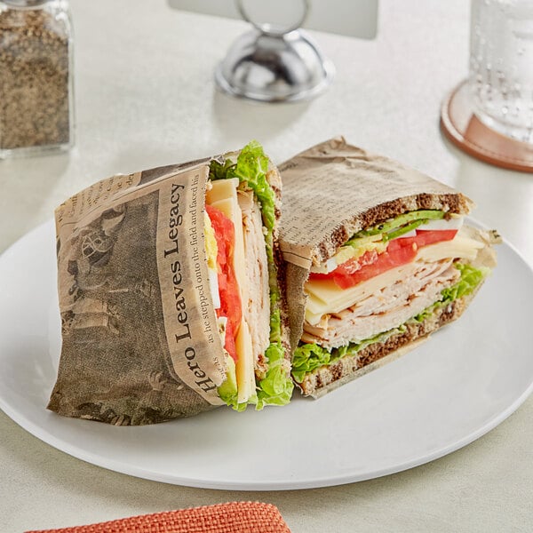 A turkey sandwich on a plate wrapped in Choice newspaper deli wrap.
