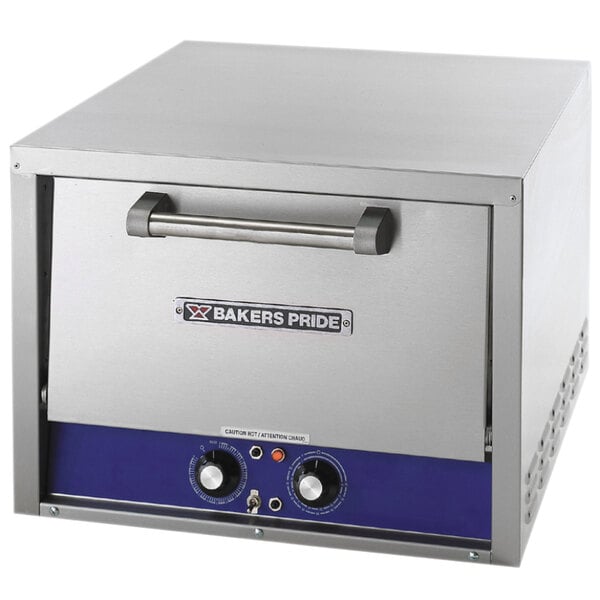 A Bakers Pride electric countertop pizza oven with blue knobs.