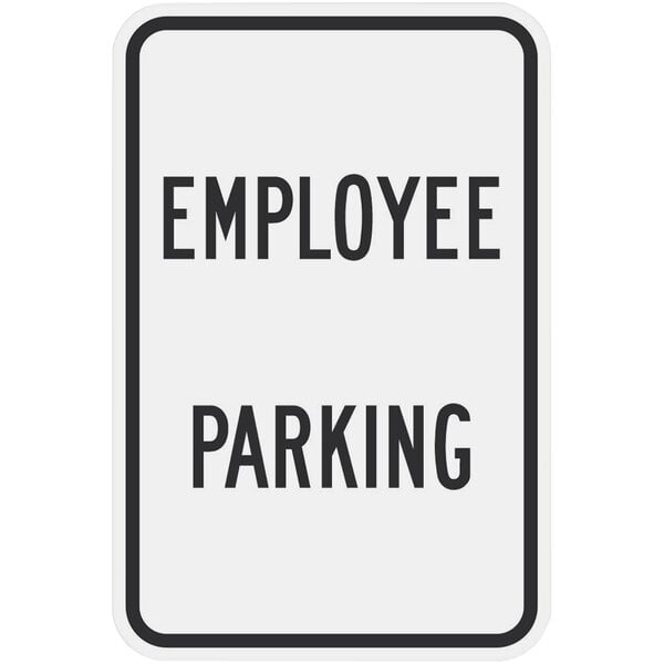 A white rectangular sign with black text reading "Employee Parking" above the Lavex logo.