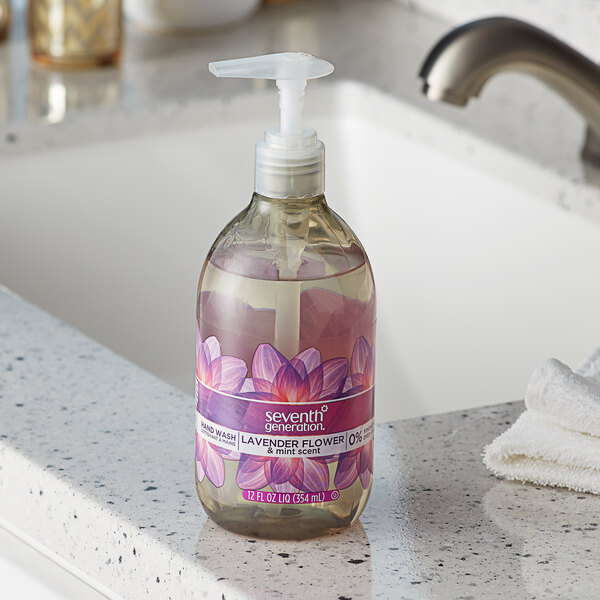 A bottle of Seventh Generation lavender flower and mint hand soap on a counter.