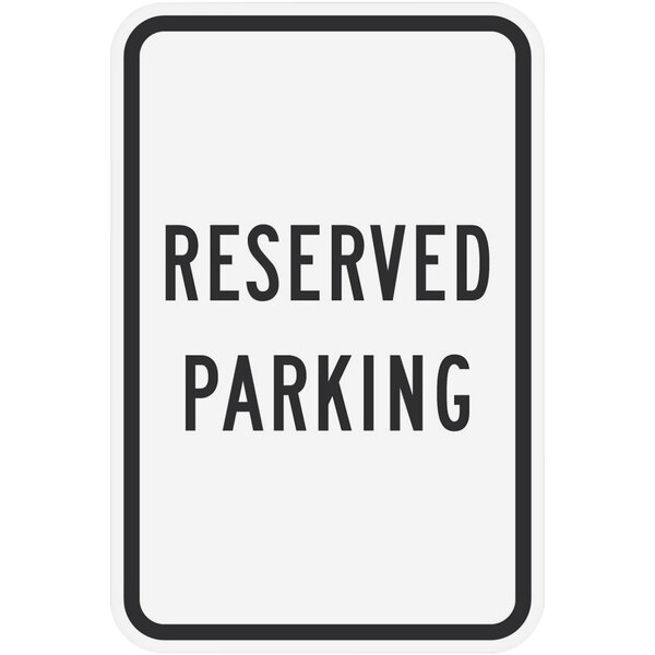 A white rectangular Lavex sign with black text reading "Reserved Parking"