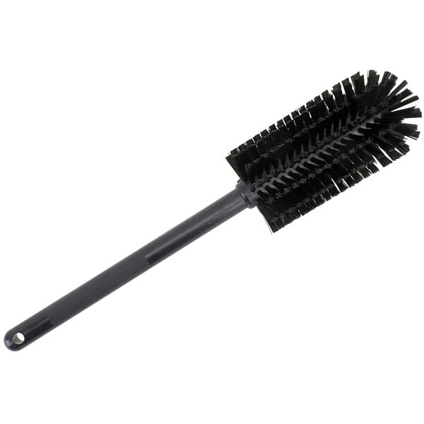 A black round brush with a handle and bristles.