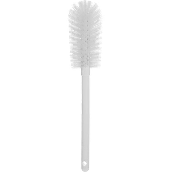 A white Carlisle Sparta bottle cleaning brush with bristles and a long handle.