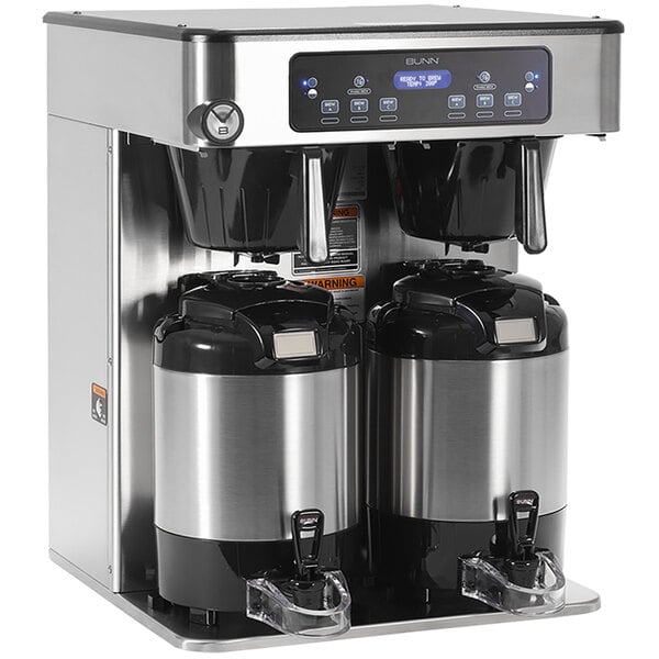 A Bunn ICB Twin Infusion Series coffee maker with two coffee containers on a counter.