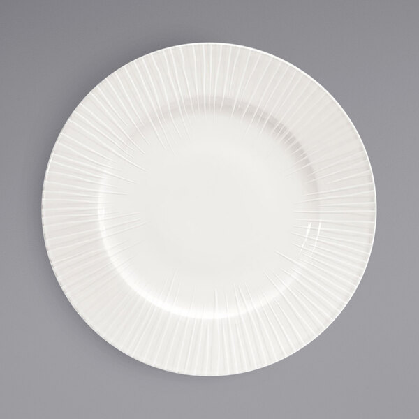 A white Front of the House porcelain plate with thin embossed lines.