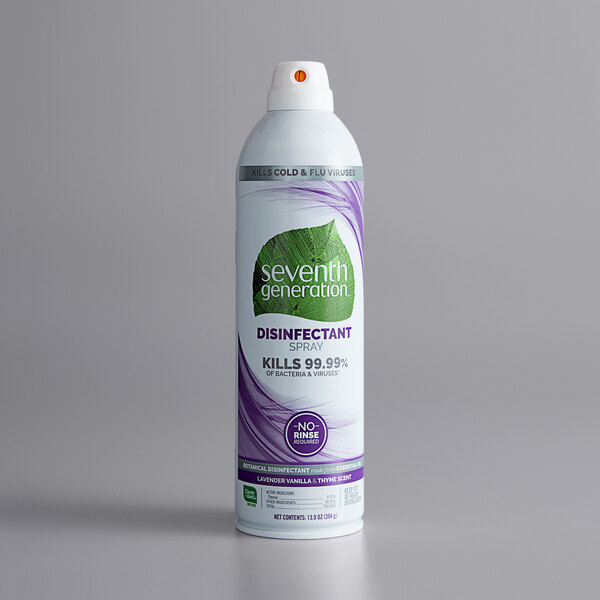 A close-up of a Seventh Generation disinfectant spray bottle with a logo.