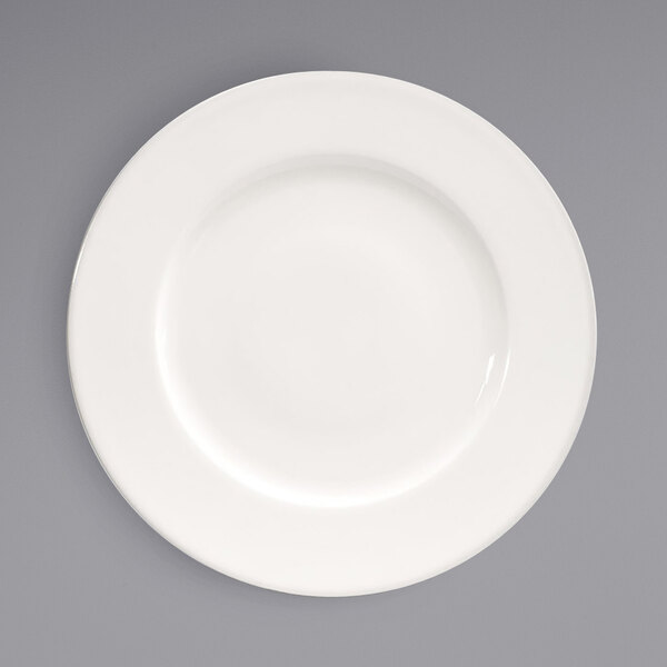 A Front of the House Catalyst Classic European White Porcelain Plate with a wide white rim.
