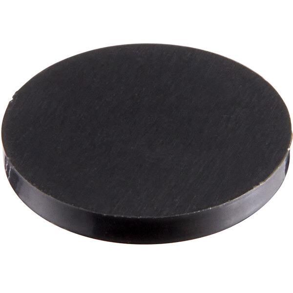 A black circular screw cover.