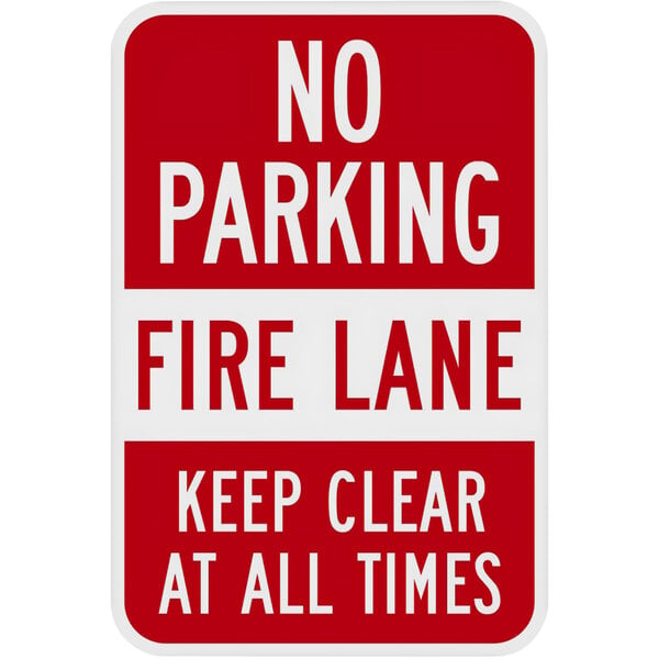 A red and white Lavex aluminum sign that says "No Parking / Fire Lane / Keep Clear At All Times"