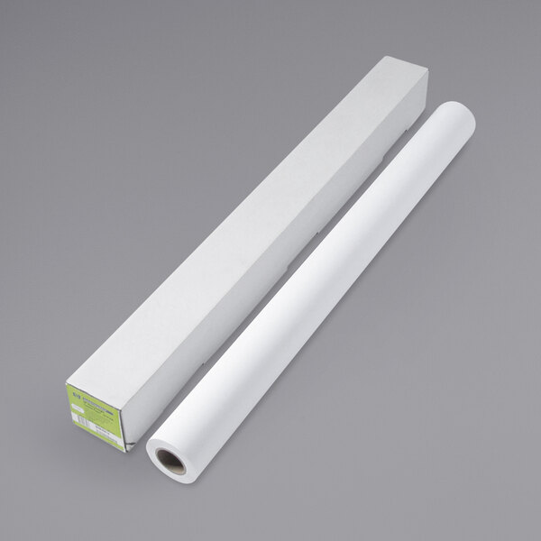 A HP Inc. DesignJet large format paper roll in a white box with a white tube.