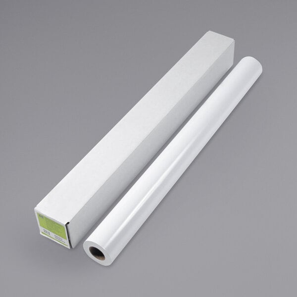 A roll of HP Inc. white satin photo paper in a white box with a green label.