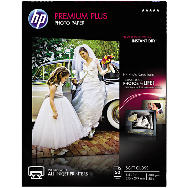 A box of HP premium plus white photo paper with 50 sheets.