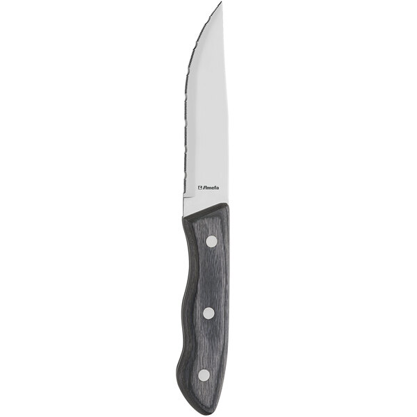 An Amefa jumbo steak knife with a black handle and silver blade.