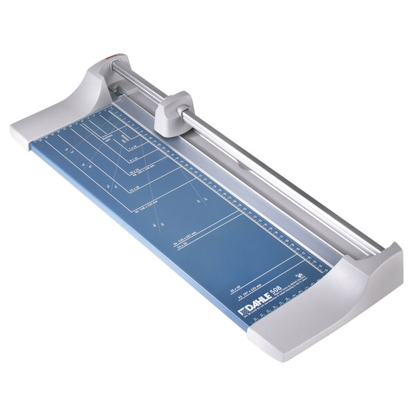 A close-up of a Dahle 508 rotary paper cutter with a blue and white handle.