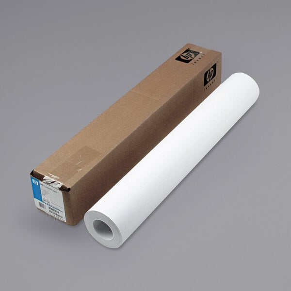HP Inc. C6019B DesignJet large format paper roll next to a box with white background.